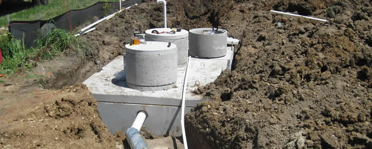 Septic system repair and installation site with tank access ports in Royal Oak, MI